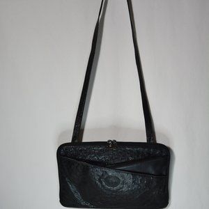 Gucci Black Ostrich Slash Pocket Embossed GG Flat Convertible Bag